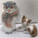 A Nao owl and a Lladro cat.