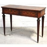 A reproduction inlaid two drawer side table raised on fluted tapering turned legs, width 104cm.