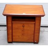 An Art Deco satin walnut magazine/side table, the moulded rectangular top above shelf and fall