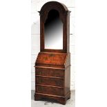 A reproduction walnut and crossbanded dome topped bureau bookcase of small proportions, the upper