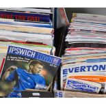 A box of ephemera including programmes relating to Ipswich, Oxford and Arsenal, also a box of