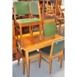 A Gordon Russell of Broadway eight piece dining room suite comprising table, six chairs and