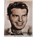 Fred MacMurray; a signed Paramount Pictures promotional photo postcard with Paramount Studios,