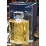 Lalique; a boxed contemporary limited edition clear and frosted glass men's fragrance bottle,