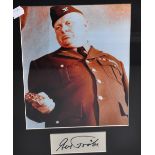 Gert Frobe; a coloured photograph of the actor in his role as Goldfinger, signed beneath and with