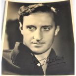 Basil Rathbone; a signed black and white photograph inscribed "Sincerely Basil Rathbone", 25.5 x