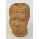 A 18th century terracotta Noc head, height 20cm.