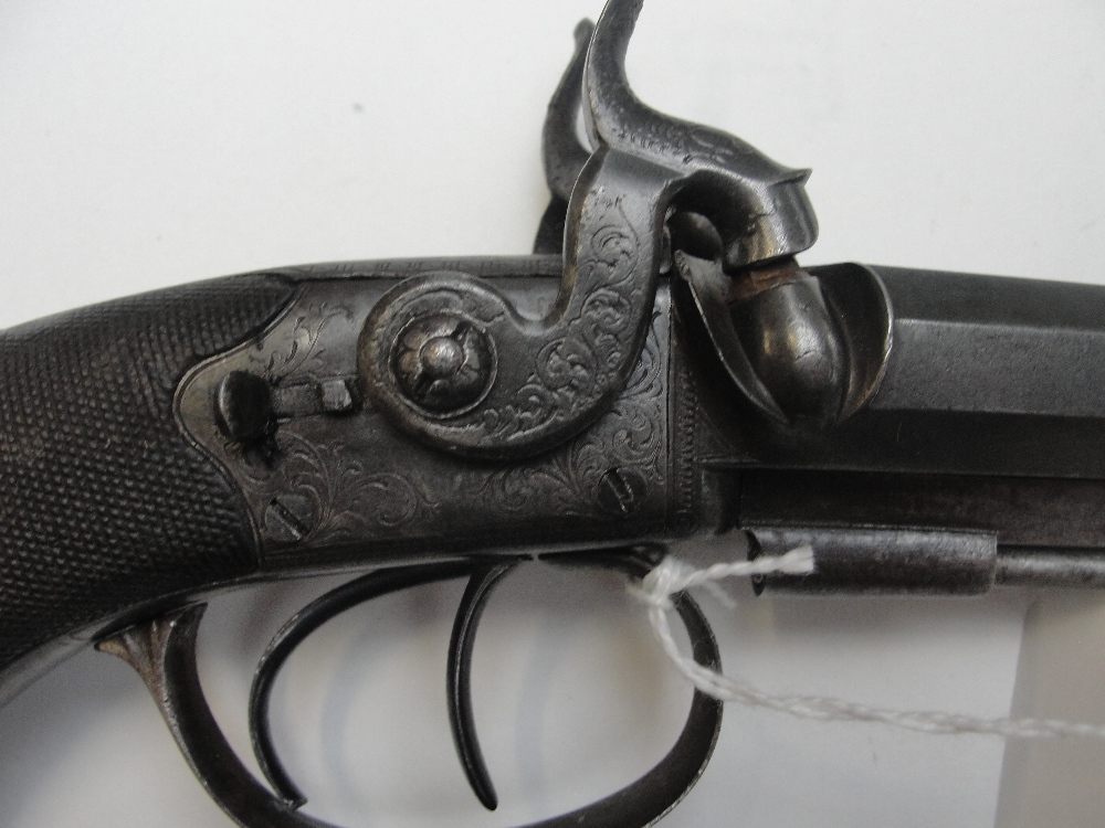 A 19th century double barrelled percussion cap pistol with foliate engraved lock and chequered - Image 3 of 8