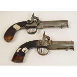 Two similar late 18th/early 19th century percussion cap pistols with incised walnut stocks and