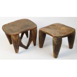 Two Senufo stools, Ivory Coast, each with incised decoration and raised on tapering supports,