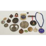A vintage Sale Golf Club silver medal; a vintage silver and enamel golf badge;