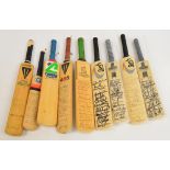 Nine signed miniature cricket bats including Yorkshire, Lancashire and Warwickshire.