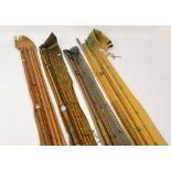 A Hardy split cane three piece fishing rod, two Hardy four piece split cane fishing rods, a Foster