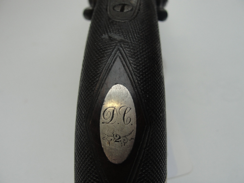 A 19th century double barrelled percussion cap pistol with foliate engraved lock and chequered - Image 7 of 8