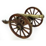 A fine George III polished bronze "Pay" cannon, stamped with George III cipher and proof marks,