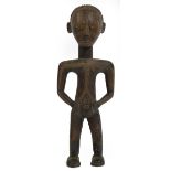 A Tabwa female figure, Democratic Republic of the Congo, height 43.5cm, width 16cm, depth 12cm.