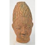 A 19th century terracotta Noc head, height 26.5cm.