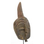 A Kota (Mbuto) Emboli mask, Gabon, height 42cm, width 18cm, depth 13cm.