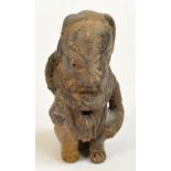 A 18th terracotta Noc seated figure, height 14cm.