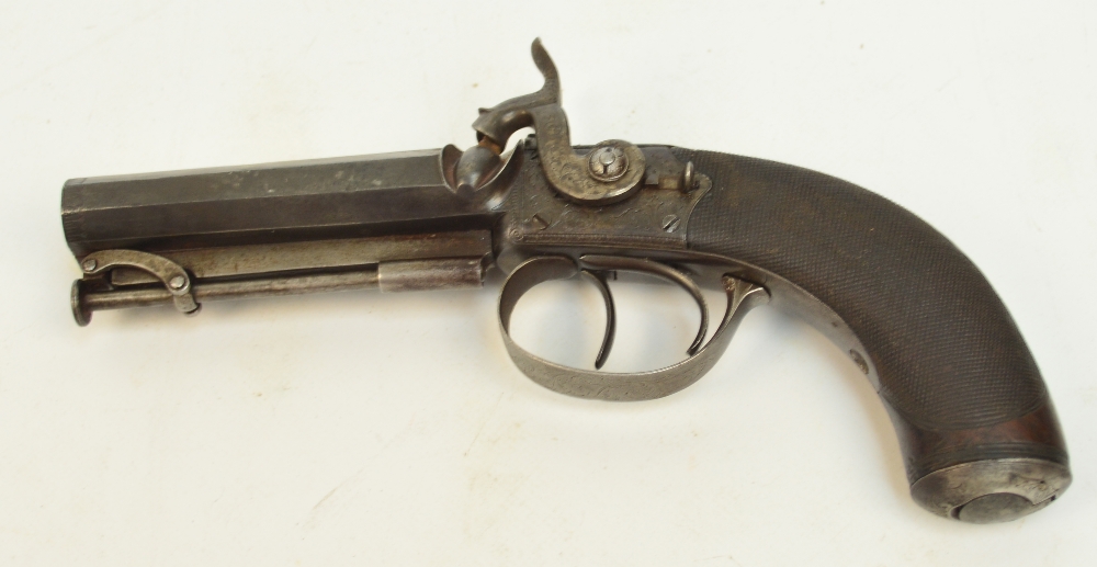 A 19th century double barrelled percussion cap pistol with foliate engraved lock and chequered