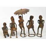 A group of five 20th century Benin bronze figures; Oba (chief), one with Kola nuts,