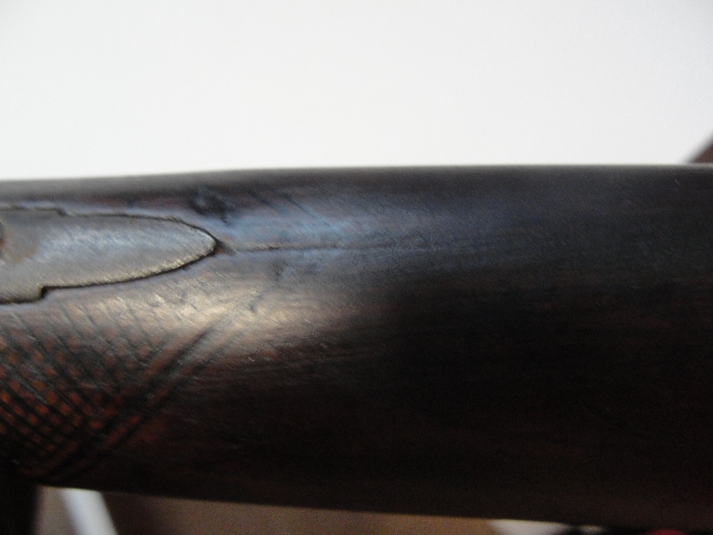 A 19th century flintlock musket with chequered walnut stock, with ramrod, indistinct markings to the - Image 4 of 5