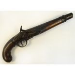 A late 18th century flintlock pistol with walnut stock and brass furniture, part of action