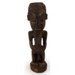 A Hemba ancestor figure, Southern Niembo, Democratic Republic of the Congo, height 33.