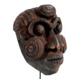 An important Wum mask, Grassland Region, Cameroon, height 34cm, width 24cm, depth 20.5cm.