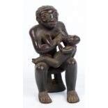 A Bamaileke maternity figure, Cameroon,