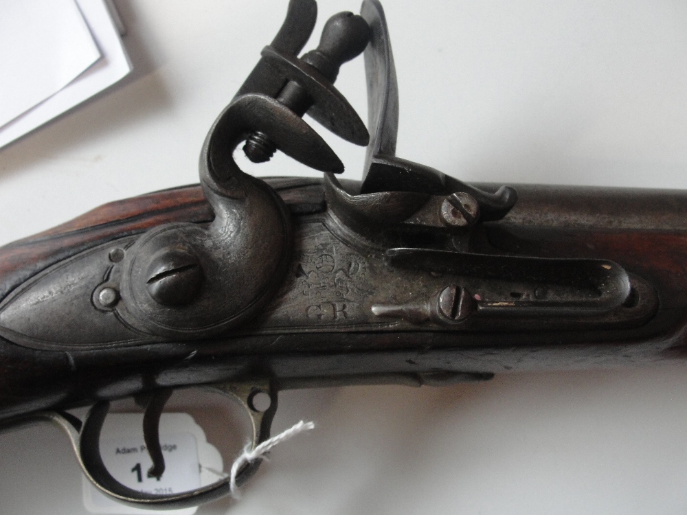 A 19th century flintlock carbine engraved to the lock plate with a crown above "GR", with Victoria - Image 8 of 9