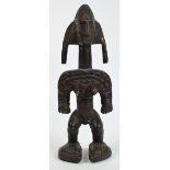 A Bamana Jonyeleni female figure, Mali, height 41cm, width 15cm, depth 11.5cm.