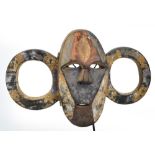 A Boa mask, Democratic Republic of the Congo, bearing original coloured pigmentation, height 41cm,