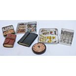 A Wheatley fly tin, a further rectangular fly tin, two fly wallets, a Hardy Bros bakelite line box,