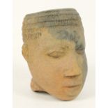 A 16th century or earlier terracotta Noc head, height 19cm.