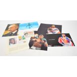 A Mohammad Ali, a signed card advertising Ovaltine, with other signed boxing photographs,