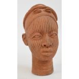 A 19th century terracotta Noc head, height 27cm.