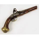 An 18th century flintlock pistol by Hardwell, with walnut stock and brass furniture, embossed mark