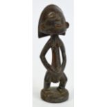 A Tabwa standing female figure, the Democratic Republic of the Congo, height 24cm, width 7cm,