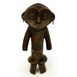 A Zande "Yanda" figure; Mani Secret Society of Nazeze type, Democratic Republic of the Congo,