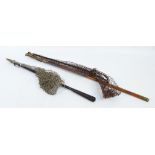 A Hardy bamboo shafted and brass mounted hinged landing net with spring action to the thumbpiece,