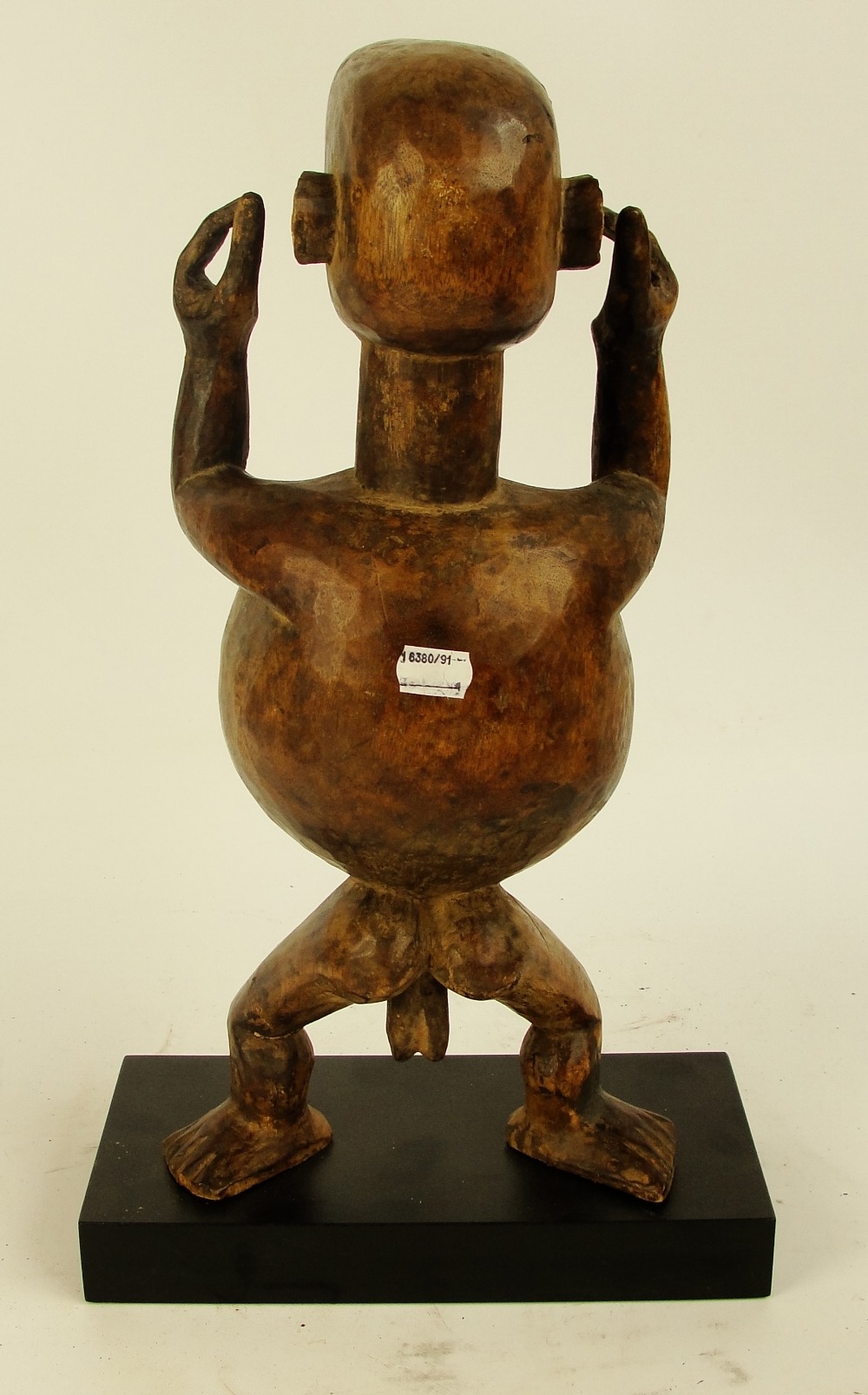 An Ibibio warning figure, Nigeria, modelled as a gent with protruding tongue, - Image 3 of 5