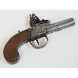 An early 19th century pocket flintlock pistol, the lock plate inscribed "Cartmell, Doncaster",