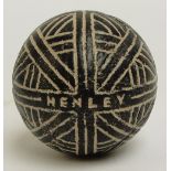 An 1890s Henley Union Jack pattern gutty golf ball, with paint to the recesses, modest use.