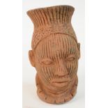 A 19th century terracotta Noc head, height 27cm.