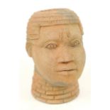 A 18th century terracotta Noc head, height 21.5cm.