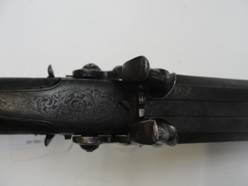 A 19th century double barrelled percussion cap pistol with foliate engraved lock and chequered - Image 8 of 8