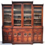 A late 19th century oak breakfront bookcase,