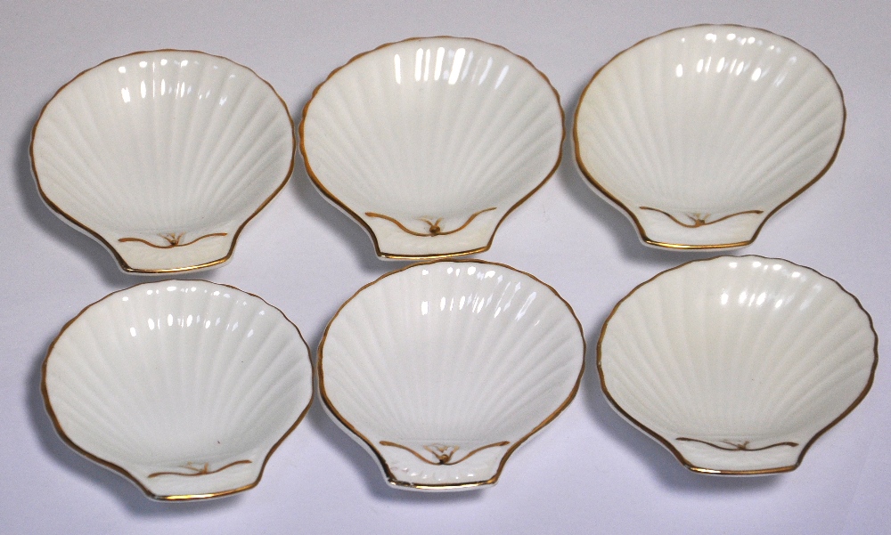 A set of six Foley china Cunard Steam Ship Company scallop moulded butter dishes, gilt heightened on