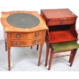 A reproduction yew wood occasional table the serpentine shaped top with leather inset top above two